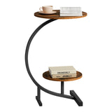Rustiek bruine ronde bijzettafel met twee bladen en zwart gebogen frame, met kopje en boeken