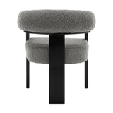 BukkitBow fauteuil met fleece bekleding in lamsvacht-look, rubberwood frame, ergonomisch en modern design, comfortabele zithouding.