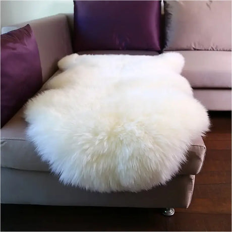 Witte BukkitBow lams- en schapenvacht, 6cm dik, wasbaar, polyester, verschillende maten, zacht en comfortabel als vloerkleed of deken.