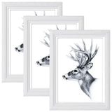 Set van vijf massief houten fotolijsten van BukkitBow met modern ontwerp en diverse maten, geschikt voor stijlvolle foto-opstellingen.