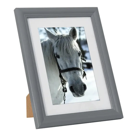 Massieve houten fotolijst van BukkitBow met glasbescherming, modern ontwerp en diverse maten, geschikt voor stijlvolle foto’s.