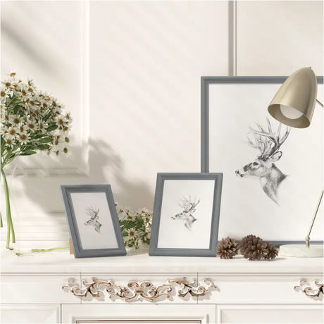 Massieve houten fotolijst van BukkitBow met glasbescherming, modern design en diverse maten, geschikt voor foto’s en kunstwerken.