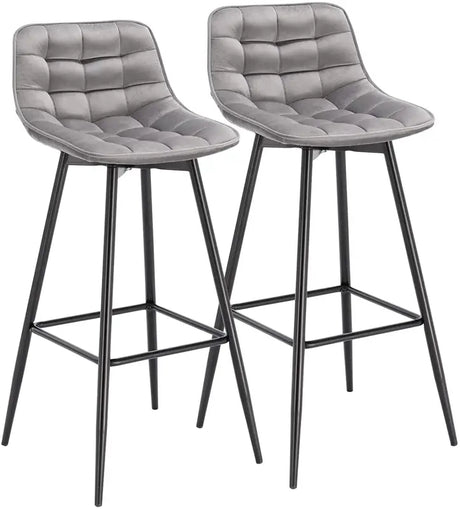 BukkitBow barkrukken met leren of fluweel bekleding, metalen onderstel en rugleuning, zithoogte 64,5 cm, tot 100 kg draagvermogen.
