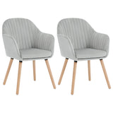Set van 2 BukkitBow eetkamerstoelen met fluwelen bekleding, armleuningen en houten poten, gestoffeerde zit en rugleuning.