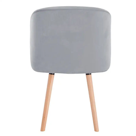 Set van 4 BukkitBow fluwelen eetkamerstoelen met massief houten frame, ergonomisch ontwerp en zithoogte van 47 cm.
