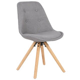 Set van 4 linnen eetkamerstoelen BukkitBow met massief houten poten, ergonomisch ontwerp en zithoogte van 46 cm.