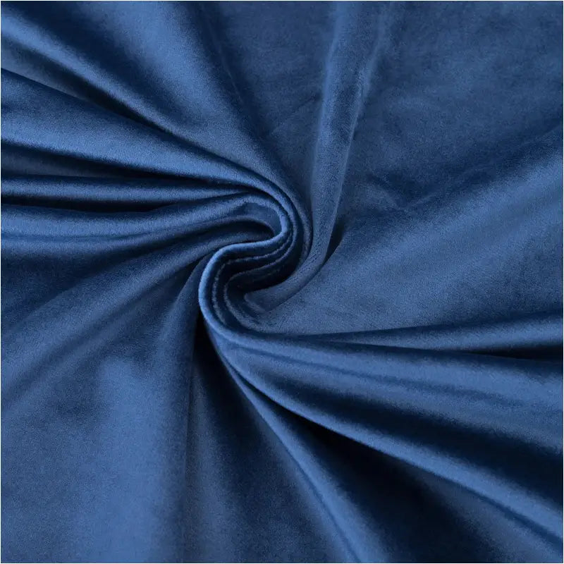 BukkitBow verduisteringsgordijn van polyester velours, 300g/m², in verschillende maten en kleuren, hangt aan een raam.