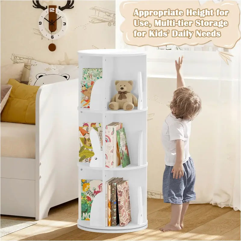 Witte draaibare kinderboekenkast van BukkitBow met 4 niveaus en staande planken voor kinderen.