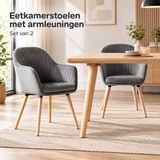 eetkamerstoelen met armleuningen in gebruik in een passende praktijksituatie