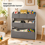 speelgoedkast met bakken in gebruik in een passende praktijksituatie