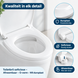 Witte toiletbril softclose van BukkitBow, afneembaar en o-vormig, gemaakt van duurzaam duroplast, detailclose-up.